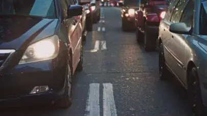 Cars sit in stand-still traffic, meant to represent the article "What Happens After a Lyft or Uber Accident?" by MMRBH Law Office.