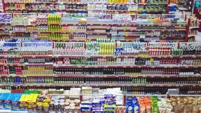 An overhead shot of a convenience store with rows of pharmaceutical products, some of which may be used in internet challenges that may spark questions about product liability laws.