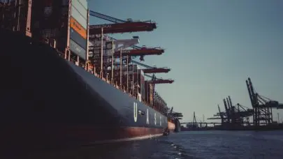 photo of a large shipping barge, on which the workers may qualify for a Jones Act claim