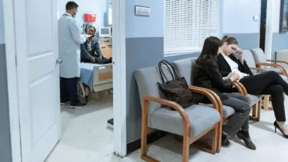 A hospital waiting room with patients sitting in chairs, meant to serve as a header image for the article "Medical Malpractice Frequently Asked Questions" by MMRBH Law Office.