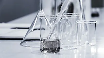 A photo of beakers and test tubes meant to represent the blog "a guide to toxic torts in louisiana" by MMRBH Law Office
